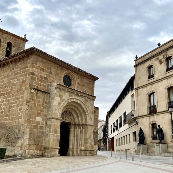 SORIA,SPAIN - JUNE 25, 2022 -View at the Provincial Administration Palace with San Juan de Rabanera church in Soria.